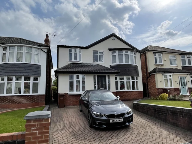 Rendered semi-detached house with bay windows in Bramhall
