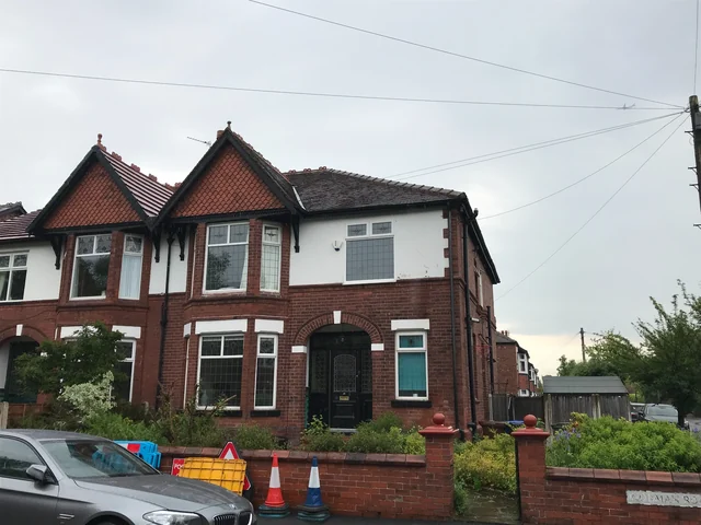 Bay-fronted semi-detached houses in Heaton Moor