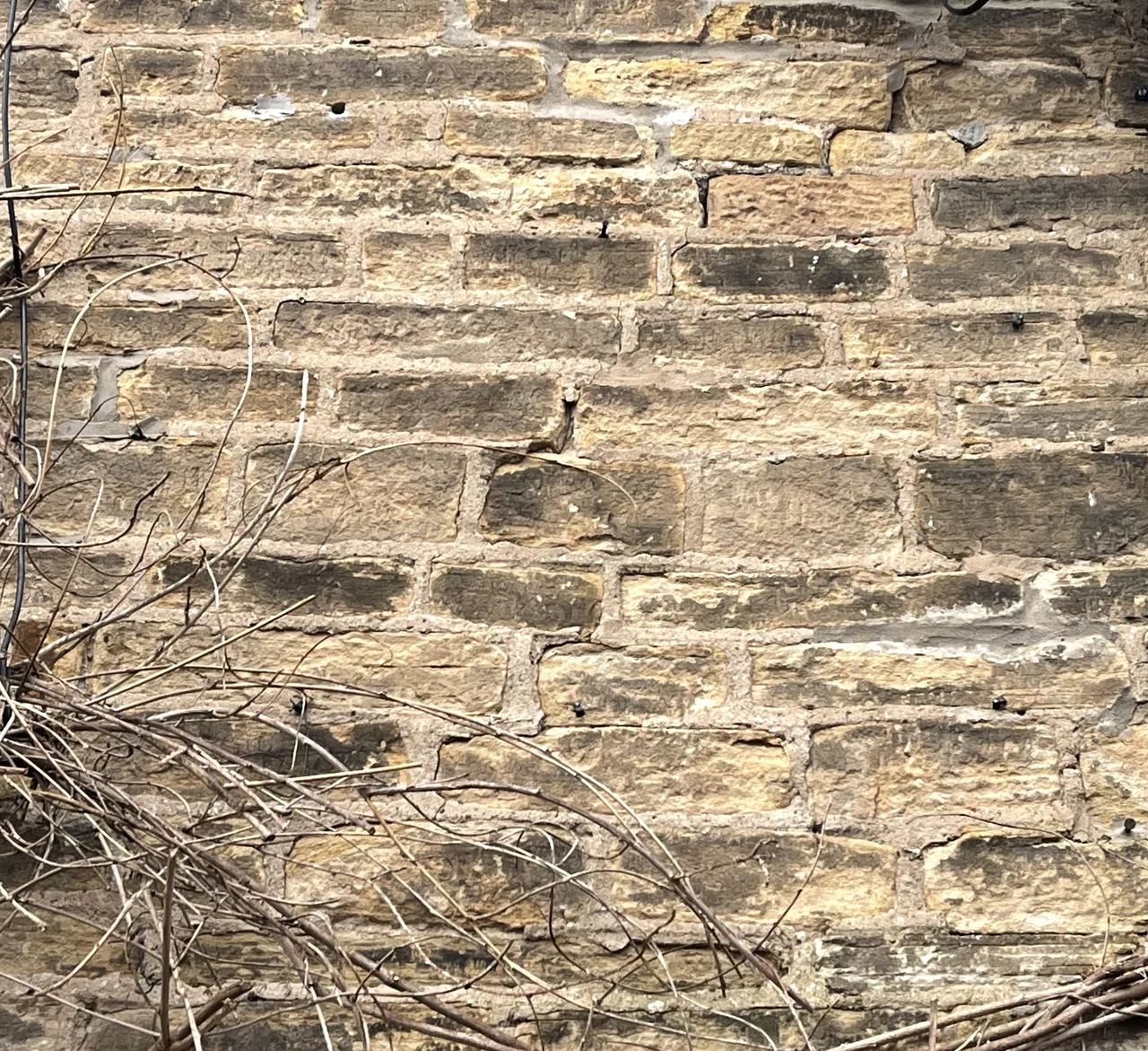 Close-up of historic stonework and mortar joints in New Mills