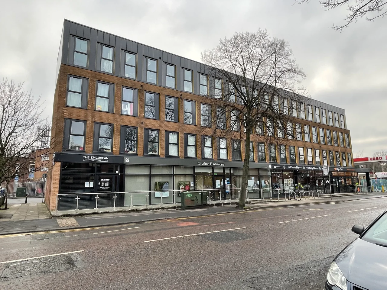 Apartments above local shops in Chorlton